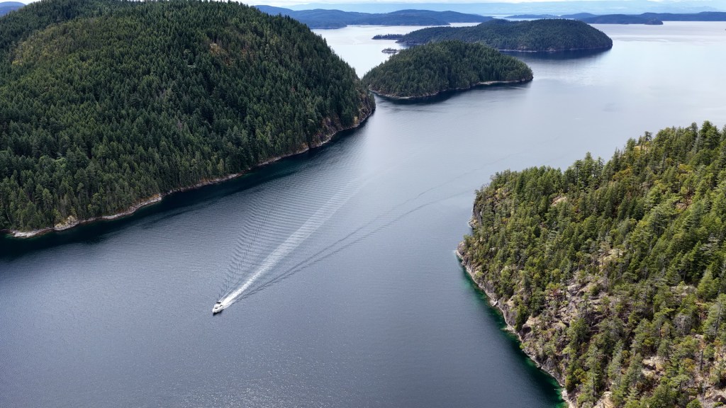 Cruising through a wide island passage on the BC coast