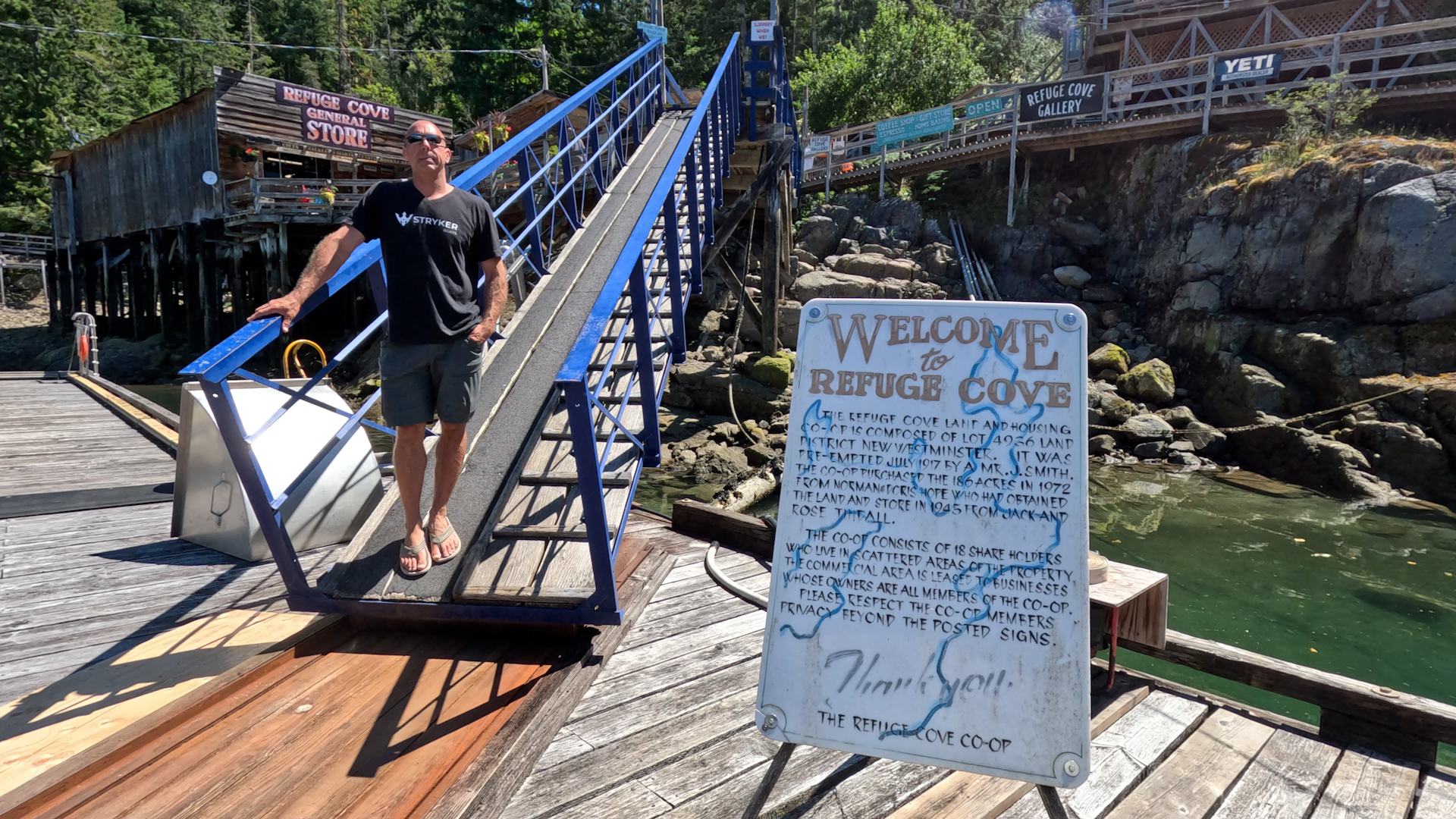 Welcome to Refuge Cove sign and dock