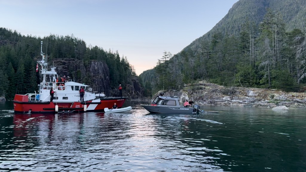 The Coast Guard vessel arriving in Walsh Cove after dark