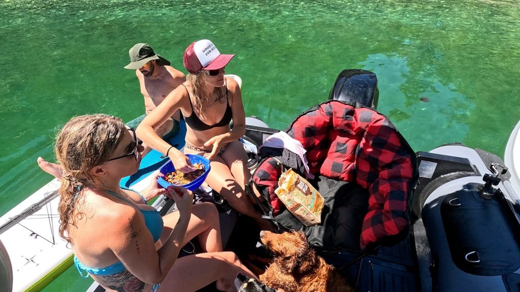 Sharing bean dip on the boat in Pendrell Sound